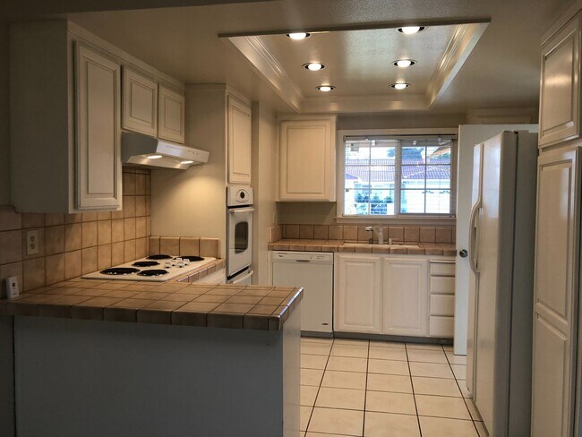 Building Photo - 4bd/2ba - Bedroom Home with a Lap Pool! Excellent Location - Coming Soon!