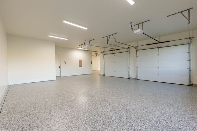 Building Photo - Gorgeous Custom Single Story with RV Garage