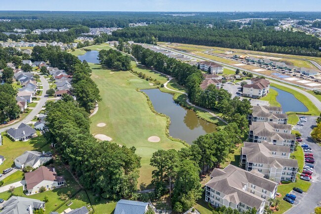 Building Photo - Modern 4BR Home with Screened Porch & Pond Views | Sun Colony, Longs SC