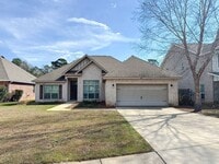 Building Photo - Well maintained 4 bedroom home with 2 car garage