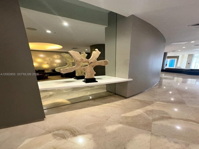 Building Photo - 10275 Collins Ave