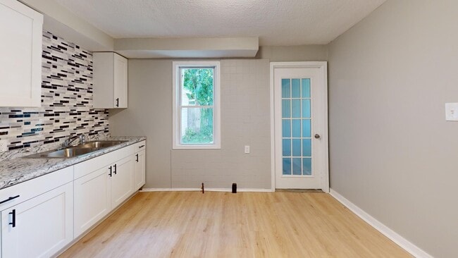 Building Photo - SPRING SPECIAL RENT REDUCTION - Clark/W.44 area: updated 3 bedroom/1 bath single family house.