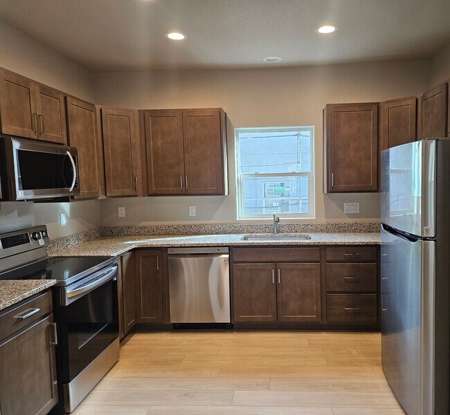 Building Photo - Unveiling Luxury Living: Townhomes with Ma...