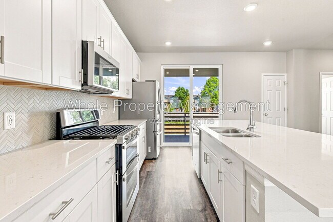Building Photo - 12231 W 57th Dr