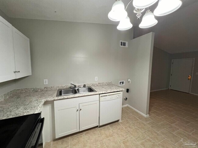 Building Photo - 6809 Tiki Ln