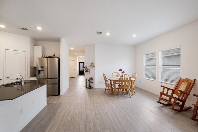 Building Photo - Move-In Ready Gem with Open Layout & Prime Location