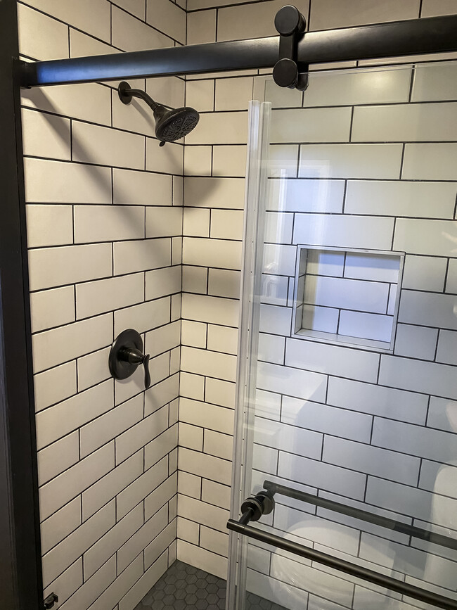 Custom tile shower in mid-level bathroom - 1606 S Lake Irving Dr SW