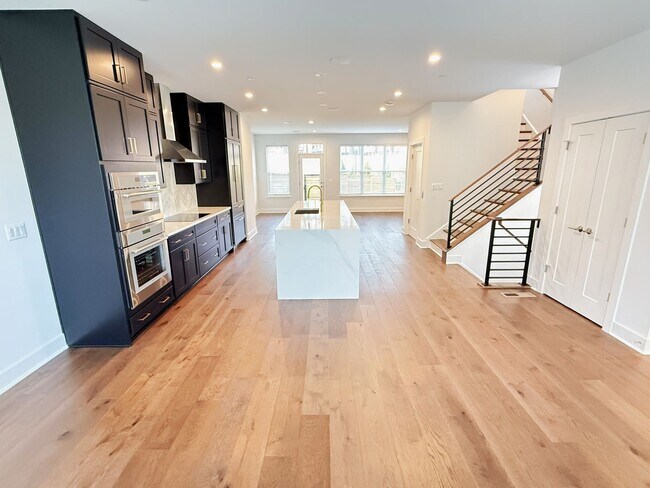 Building Photo - Brand new 4 level, 4 Bedroom Townhome with Elevator!