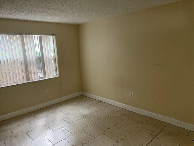 Building Photo - 4235 N University Dr