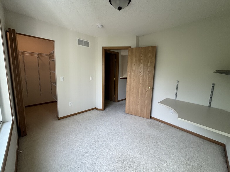 second angle of second upstairs bedroom - 7792 Village Pl