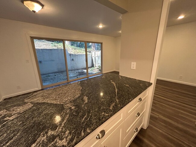 Building Photo - Move-In-Ready two-story townhome located o...