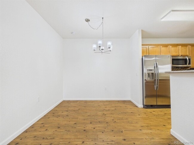 Building Photo - 10239 W 55th Dr