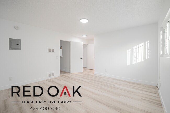 Building Photo - 211 S Ave 57