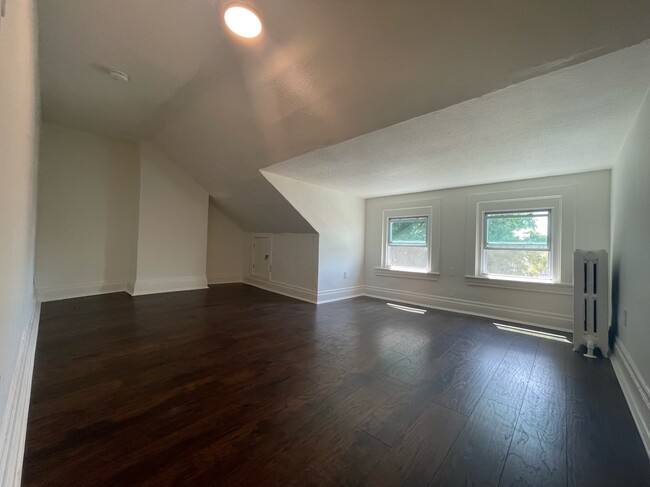 3rd floor front bedroom from doorway - 5859 Nicholson St