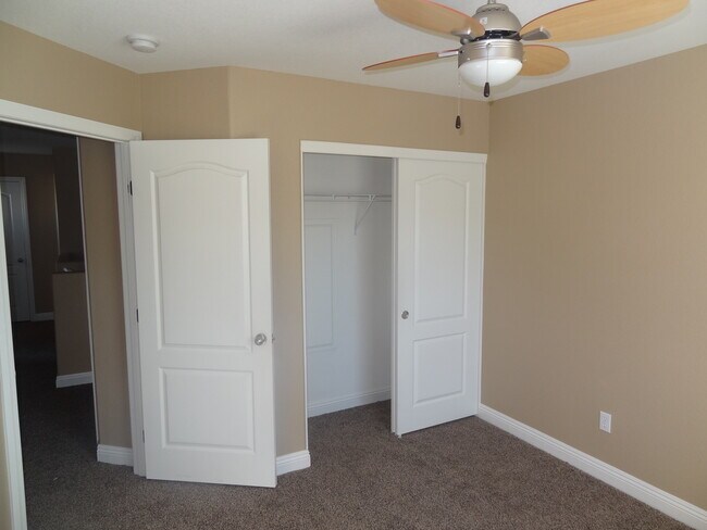Building Photo - 3 Bedroom, 2 1/2 Bath Home With Attached Garage In A Gated Community