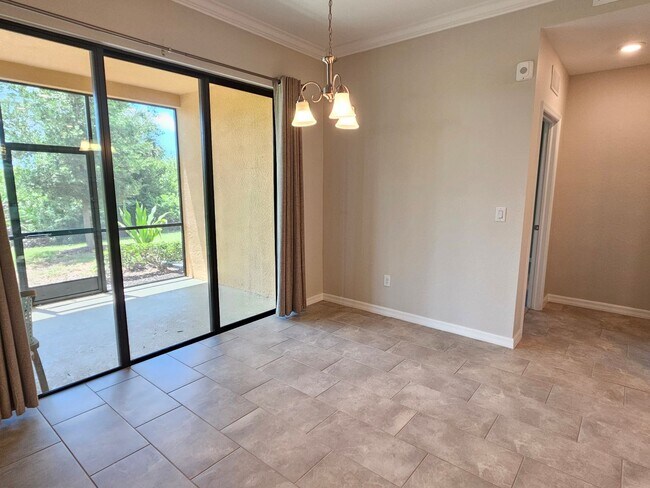 Building Photo - Annual Unfurnished 2 Bedroom 2 Bathroom First Floor Condo with 1 Car Garage in Sarasota National!
