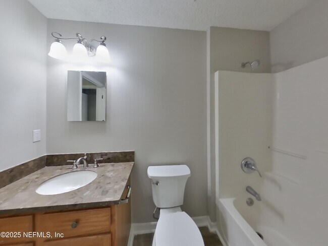 Building Photo - 7944 Cherry Blossom Dr S