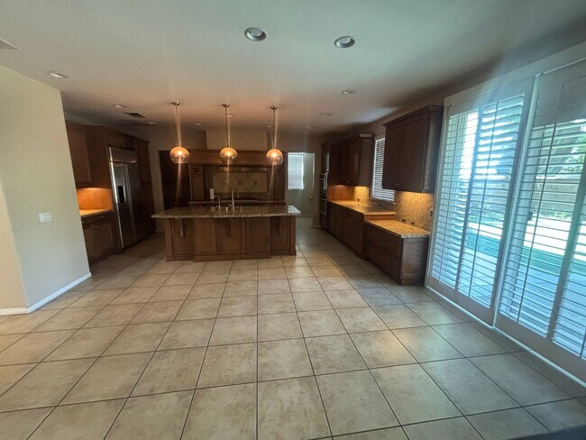 Building Photo - Short Term Lease - Grand 4-Bedroom Home with Entertainer's Yard in Gated River Village!