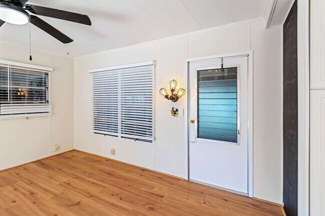 Building Photo - Charming 2BR/2BA Waterfront Home for Rent with Canal Access & Two Garages