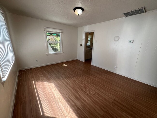 Building Photo - Charming 2 Bedroom, 1 Bath House with Fenced Yard, Carport & Laundry Hookups