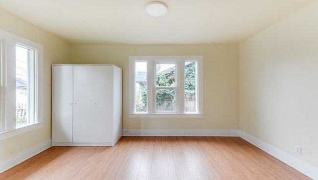 Building Photo - Charming 2 Bedroom 1 Bathroom Bungalow with Oversized 1 Car Garage and Large Manicured  Backyard ...