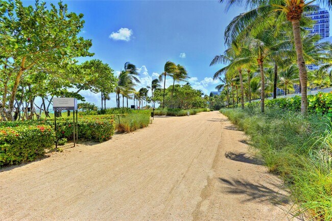 Building Photo - 10275 Collins Ave