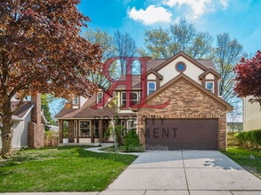 Building Photo - 7448 Gardenview Pl