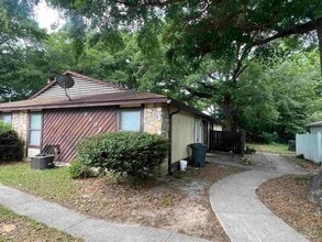 Building Photo - 6809 Tiki Ln