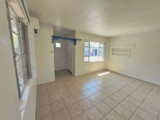 Building Photo - Two Bedroom w/ A/C, Yard and Carport