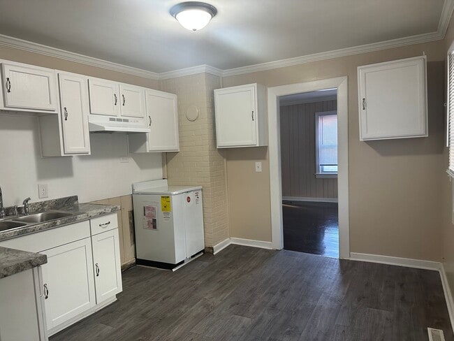 Building Photo - Coming Soon! Four-Bedroom Bungalow with Fe...