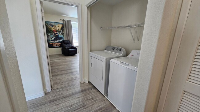 Building Photo - Partially Furnished 2/2 CONDO WITH  *BONUS DEN* & 2 CAR GARAGE!