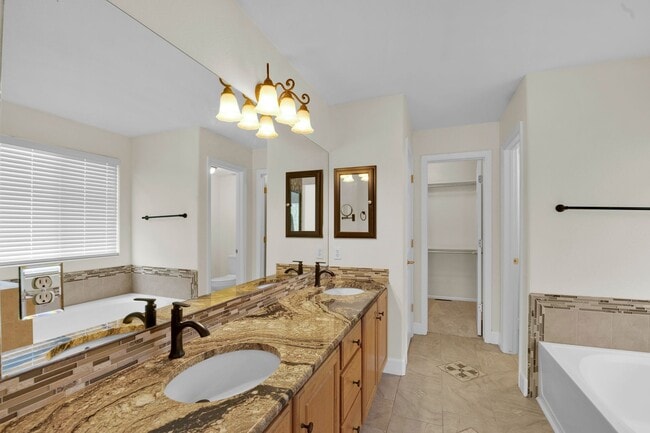 Building Photo - Beautiful home with 5 bedrooms, 3 1/2 bathrooms, 3-car garage available now!