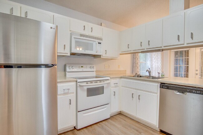 Building Photo - Northeast Pensacola 2 R, 2BA Home Near UWF with Wood-Look Flooring, Large Sunroom, Spacious Lot &...