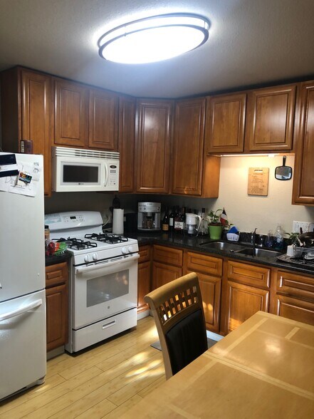 kitchen and eating area part of studio - 1077 12th Street