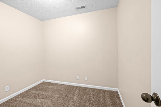 Building Photo - Pet Friendly Three Bedroom with Bonus!