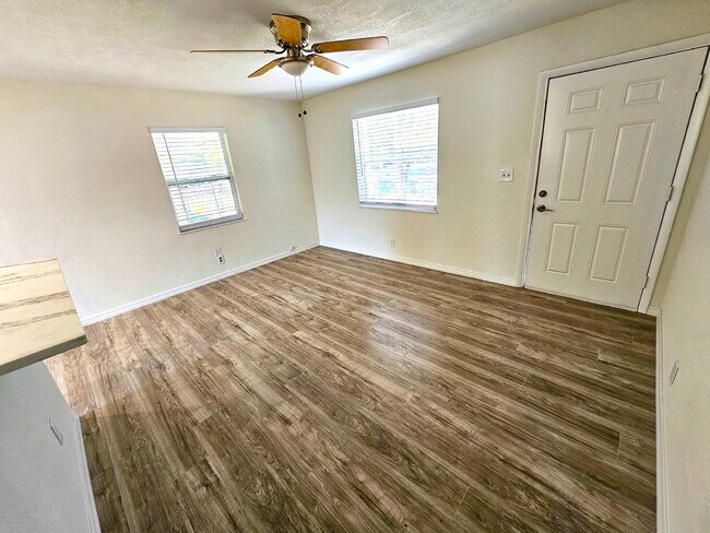 Building Photo - fully renovated 2-bedroom, 1-bathroom home with bonus guest room or office and oversized fenced yard