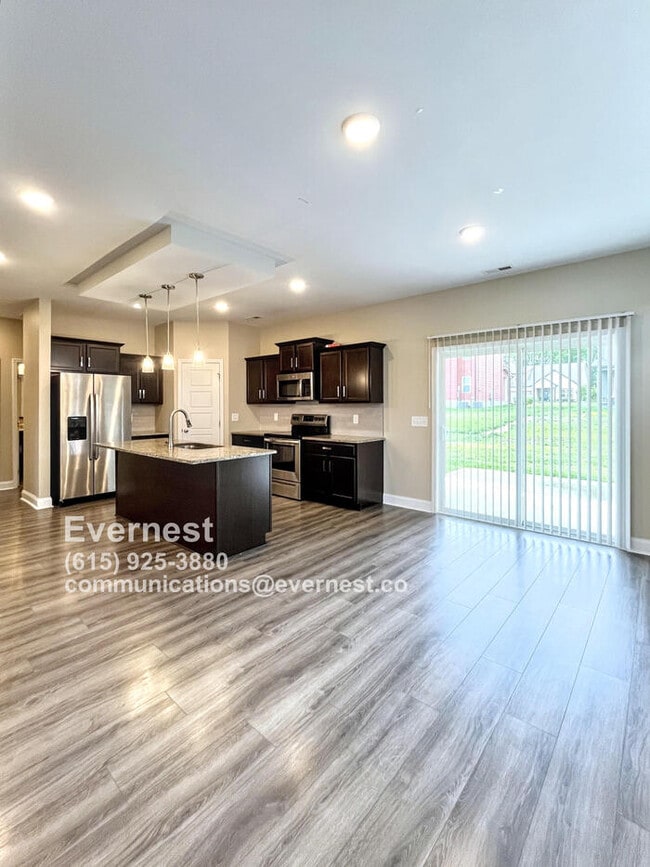 Building Photo - Spacious 4-Bedroom Home with Modern Comfor...