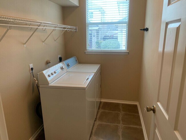 Building Photo - *COMING SOON* Gated Community: 3-Bedroom with Upstairs Loft, Fenced Backyard & Prime Location!