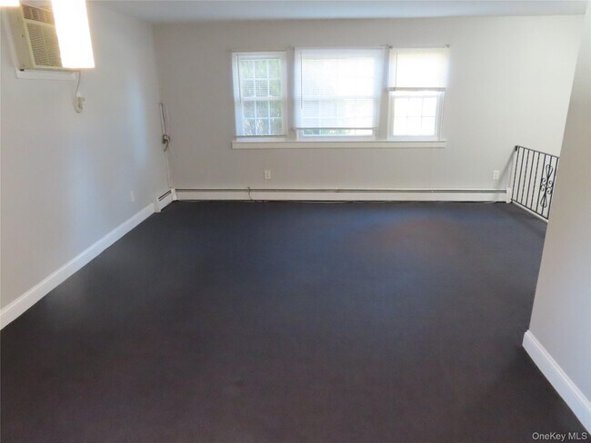 Building Photo - 1210 Smithtown Ave