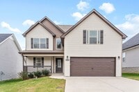 Building Photo - Pet Friendly Three Bedroom with Bonus!