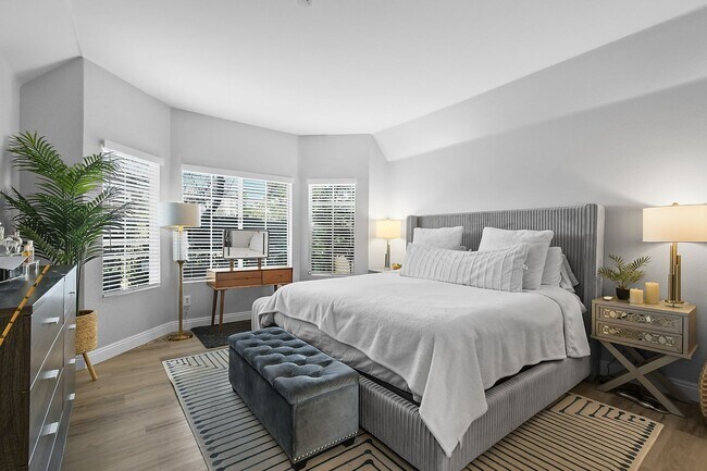 Building Photo - Remodeled River-View Corner Unit with Oversized Patio