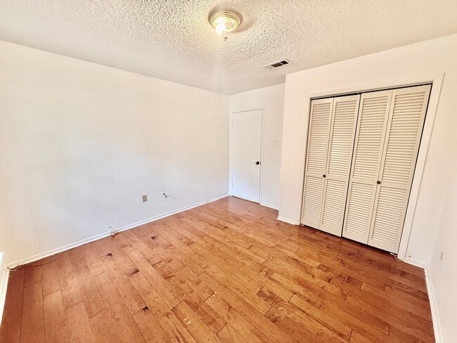 Building Photo - Charming 3BR/2BA Brick Home in Perkins Village – Spacious Yard & Cozy Fireplace