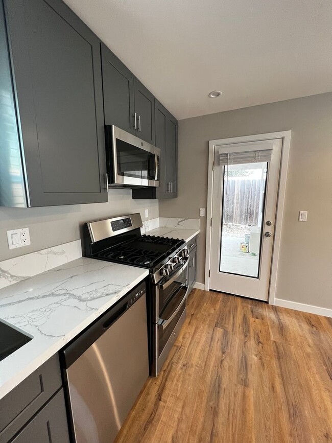 Building Photo - 4 master bedrooms utilities included in price