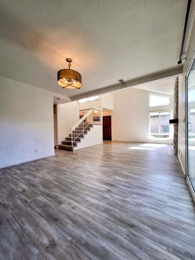 Building Photo - Spacious Two-Story 3bd Townhouse With Private Patios, Balcony, & Garage