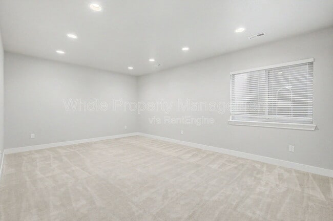 Building Photo - 9985 E 59th Ave