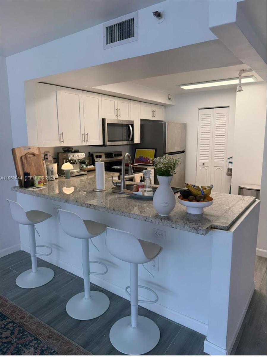 Building Photo - 555 NE 15th St