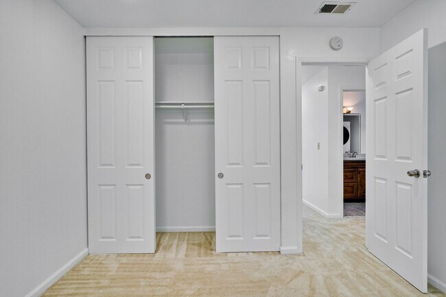 Building Photo - Spacious condo available in desirable Newpark Village community!