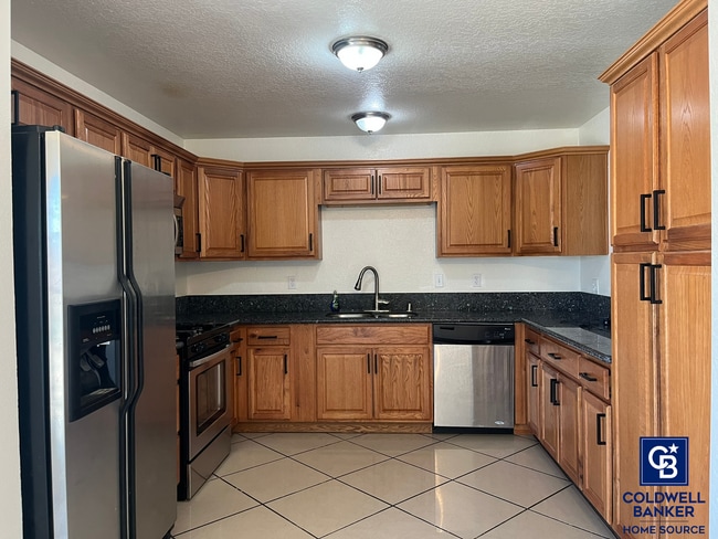 Building Photo - Move-In Ready Beauty with Granite Kitchen, Stainless Steel Appliances & Expansive Backyard