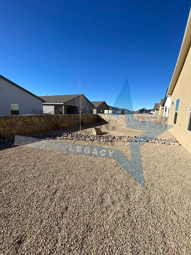 Building Photo - NEW CONSTRUCTION AND FULLY LOADED