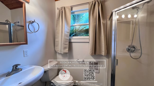 Building Photo - Quaint cottage with hardwood floors, private entrance and patio, surrounded by lush gardens!